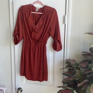 A’GACI color is burnt orange size is Medium